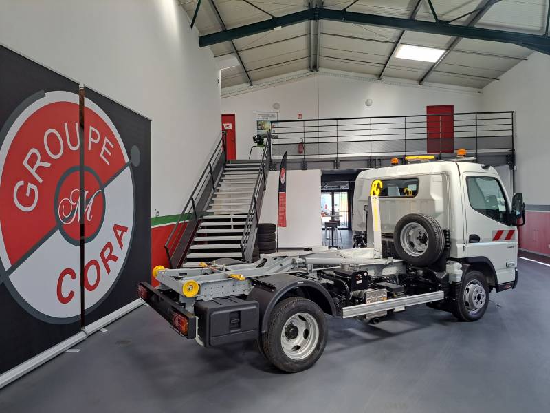 pose d'un bras ampliroll sur un fuso canter à Manosque 04 proche d'Aix en provence 13